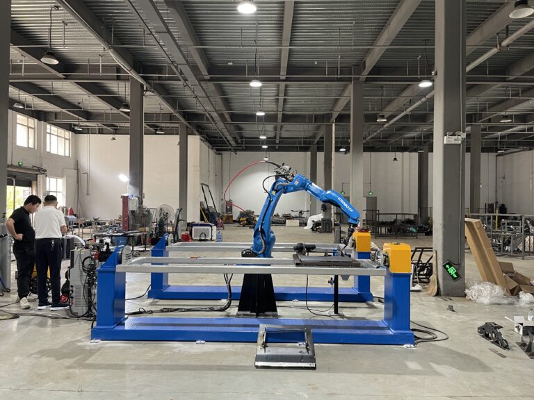 Robot welding station assembling a lawn mower chassi